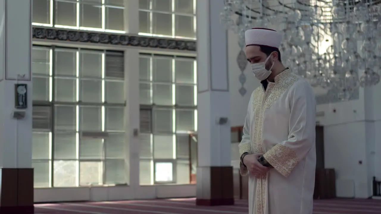 Praying Alone in A Mask In Mosque 1