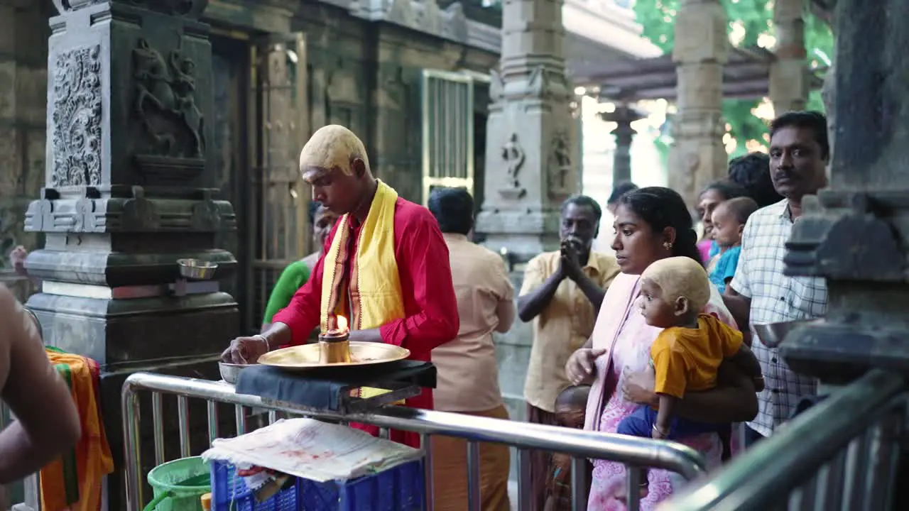 Hindu Devotees Praying at a temple