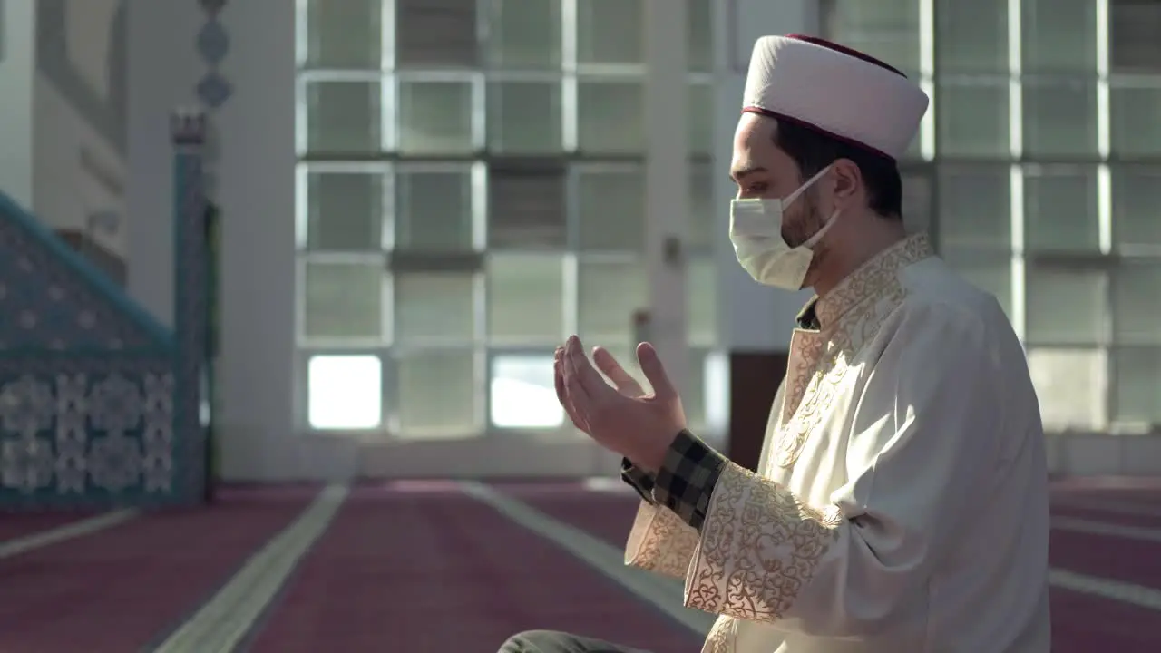 Masked Muslim Imam Praying