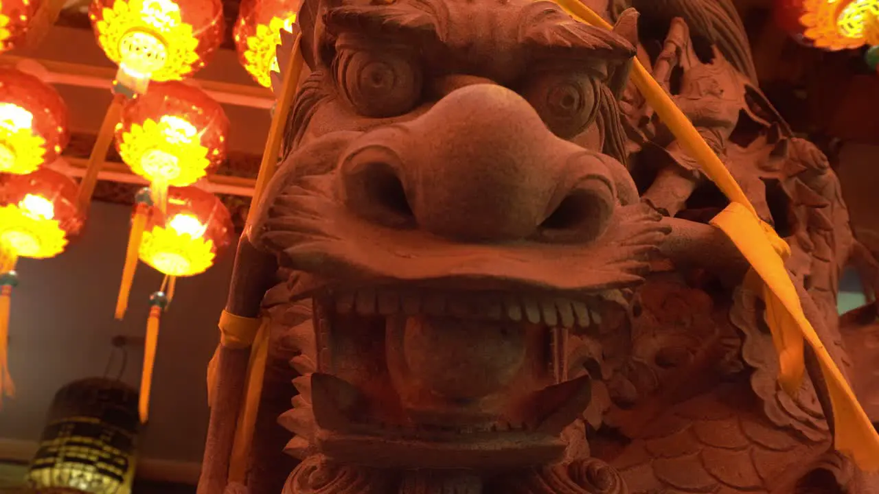 Dragon statue at chinese temple with red lantern decorated