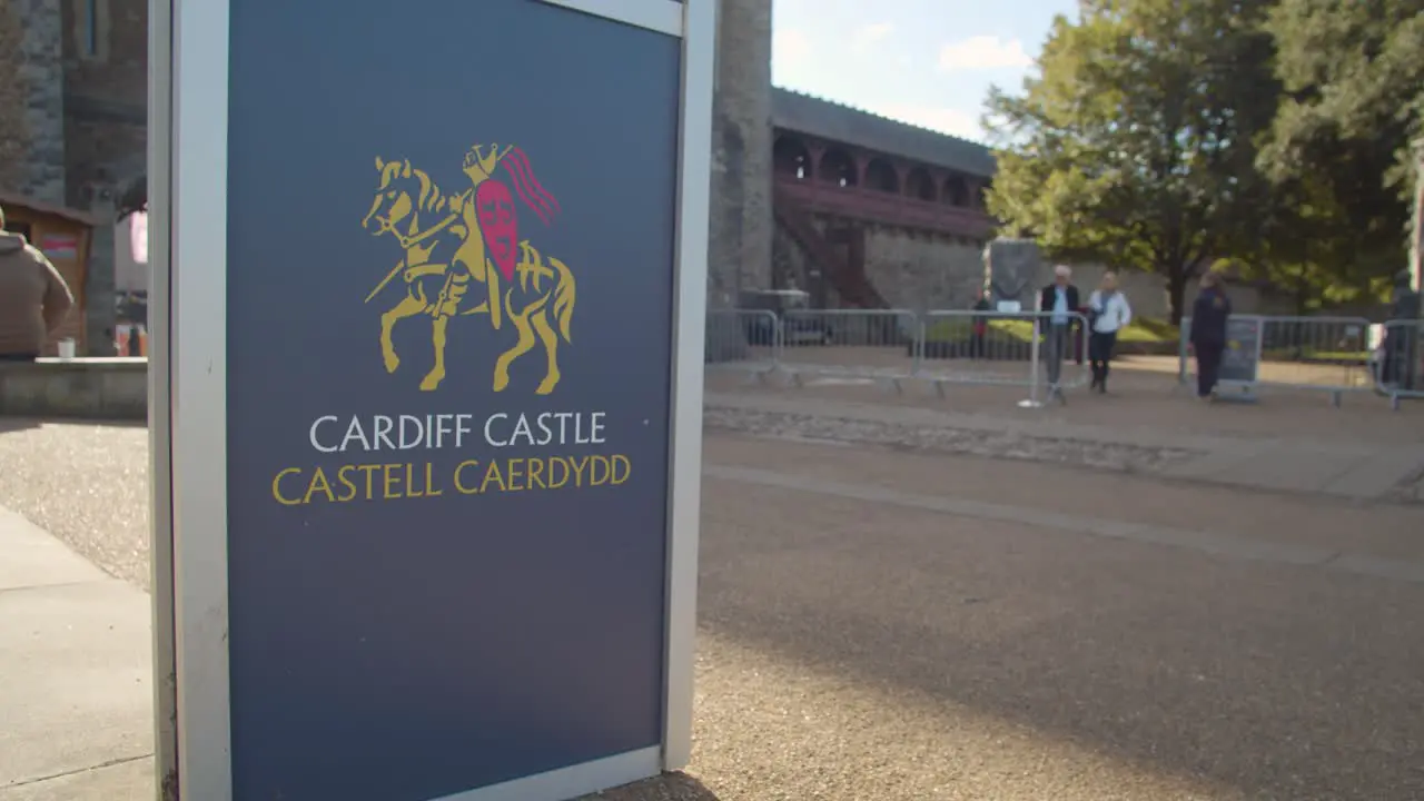 Advertising Sign Outside Cardiff Castle With Tourists 1