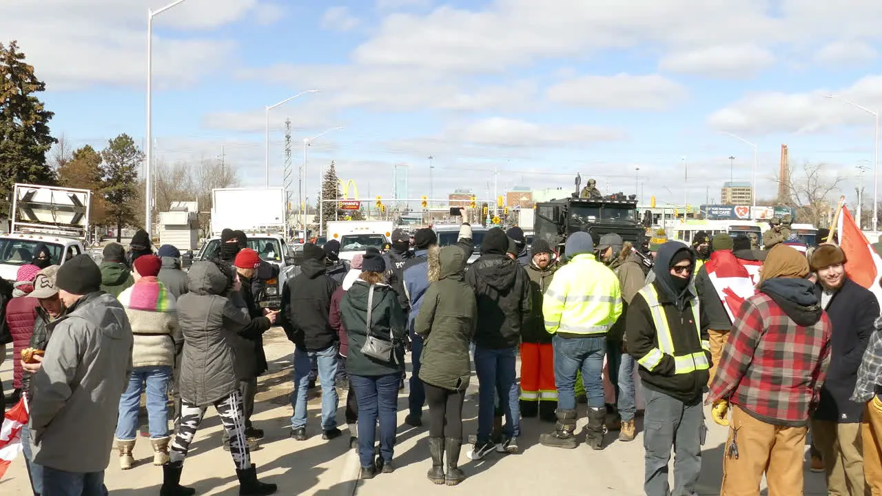 People protest on blocking road in Freedom Convoy 2022 event Ontario Canada