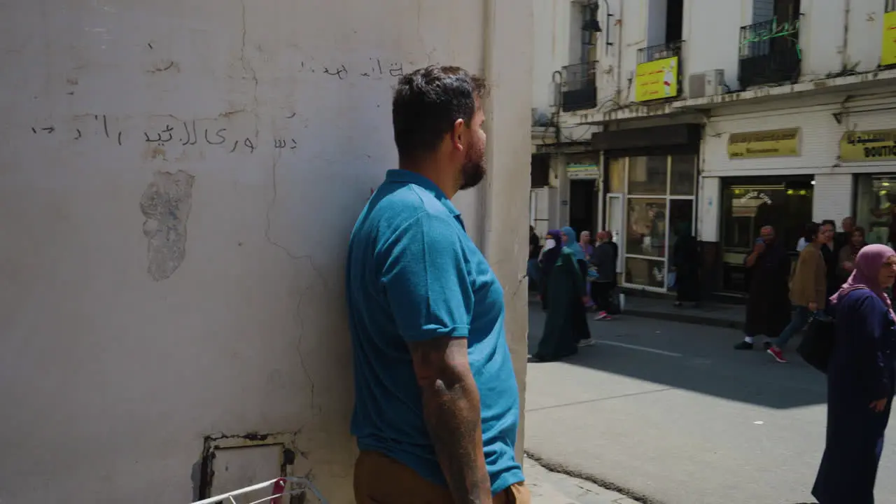 Man Looking At People On The Street In Algiers Algeria At Daytime