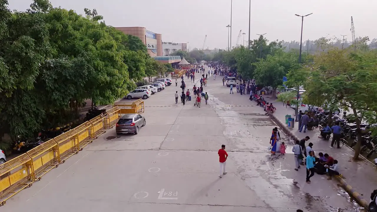 people walking on footbridge at railway station at day shot is taken at delhi india on Mar 02 2023