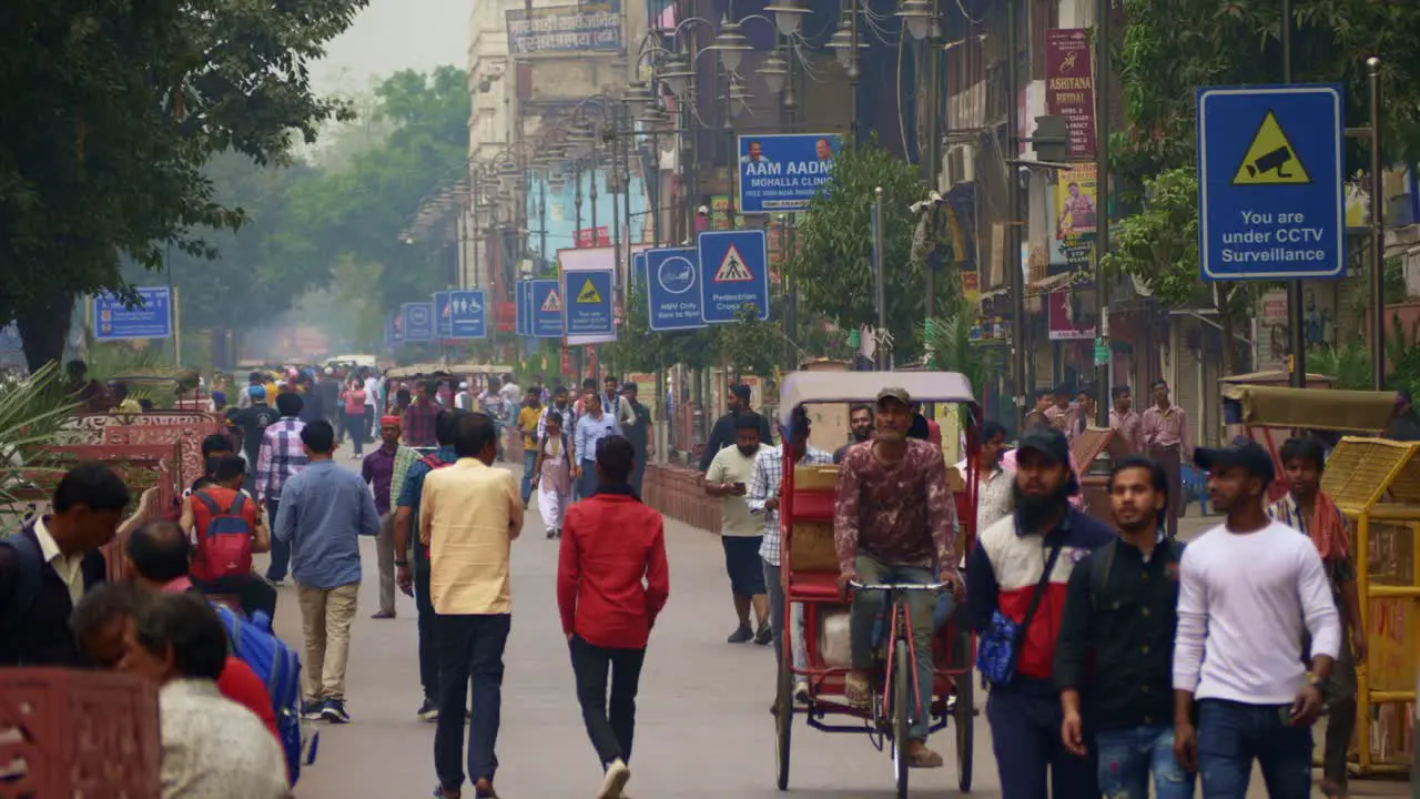 People walking at the busy street of newly developed Chandni Chowk in old Delhi India