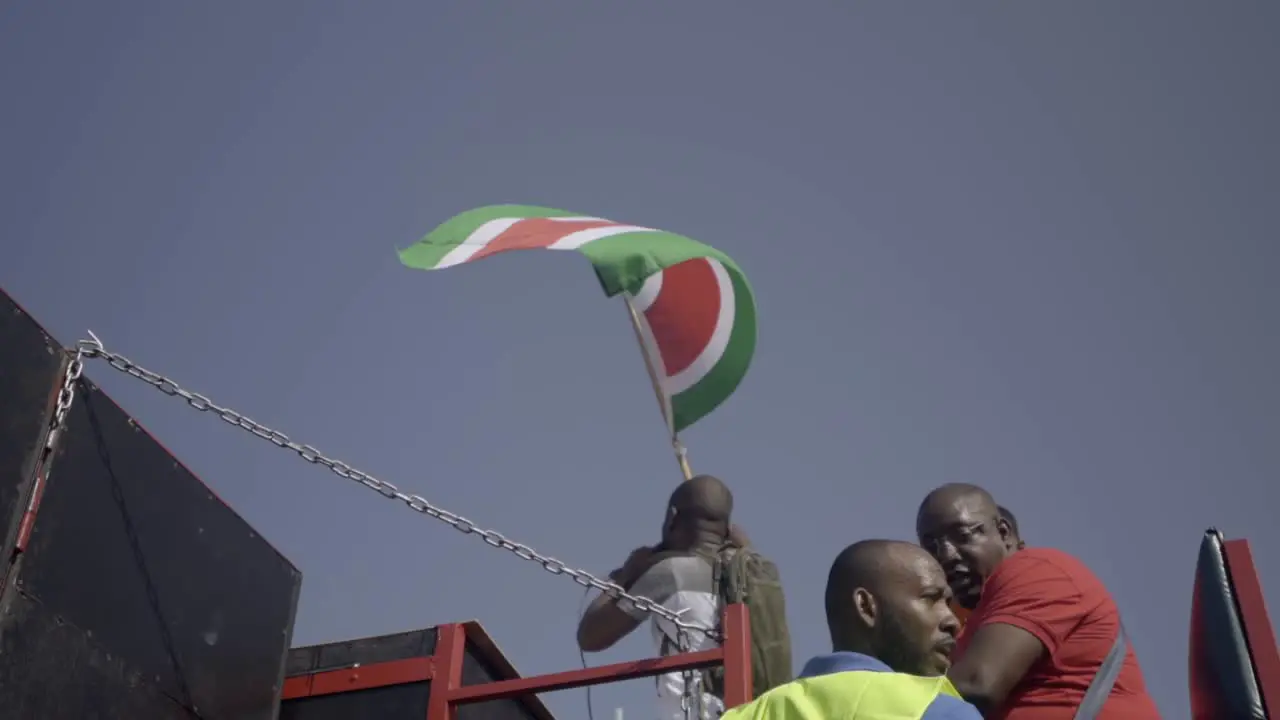 Man waving flag of Suriname slow motion