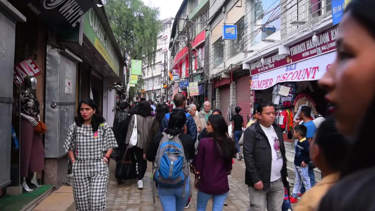 Slow Motion Shot of People walking in the famous market street Mall Road