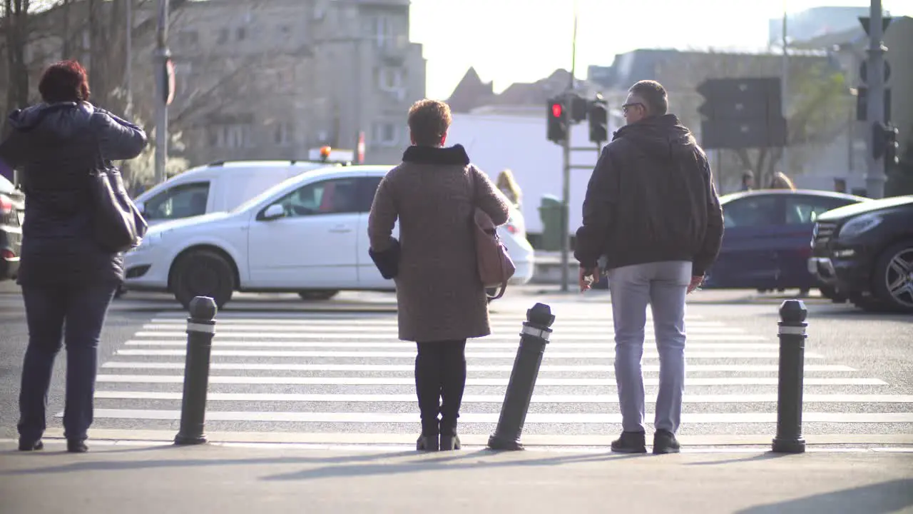 People Crossing Crosswalk In City At Rush Hour Timelapse