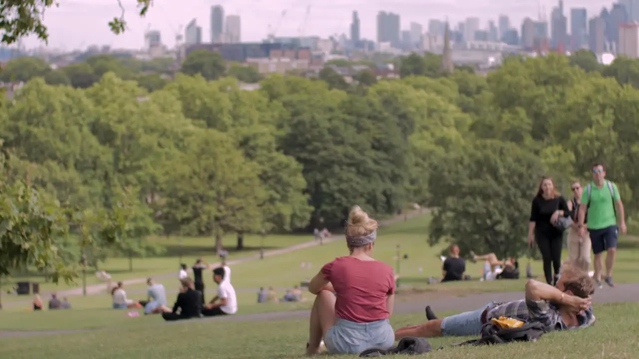 People relaxing in Park in London