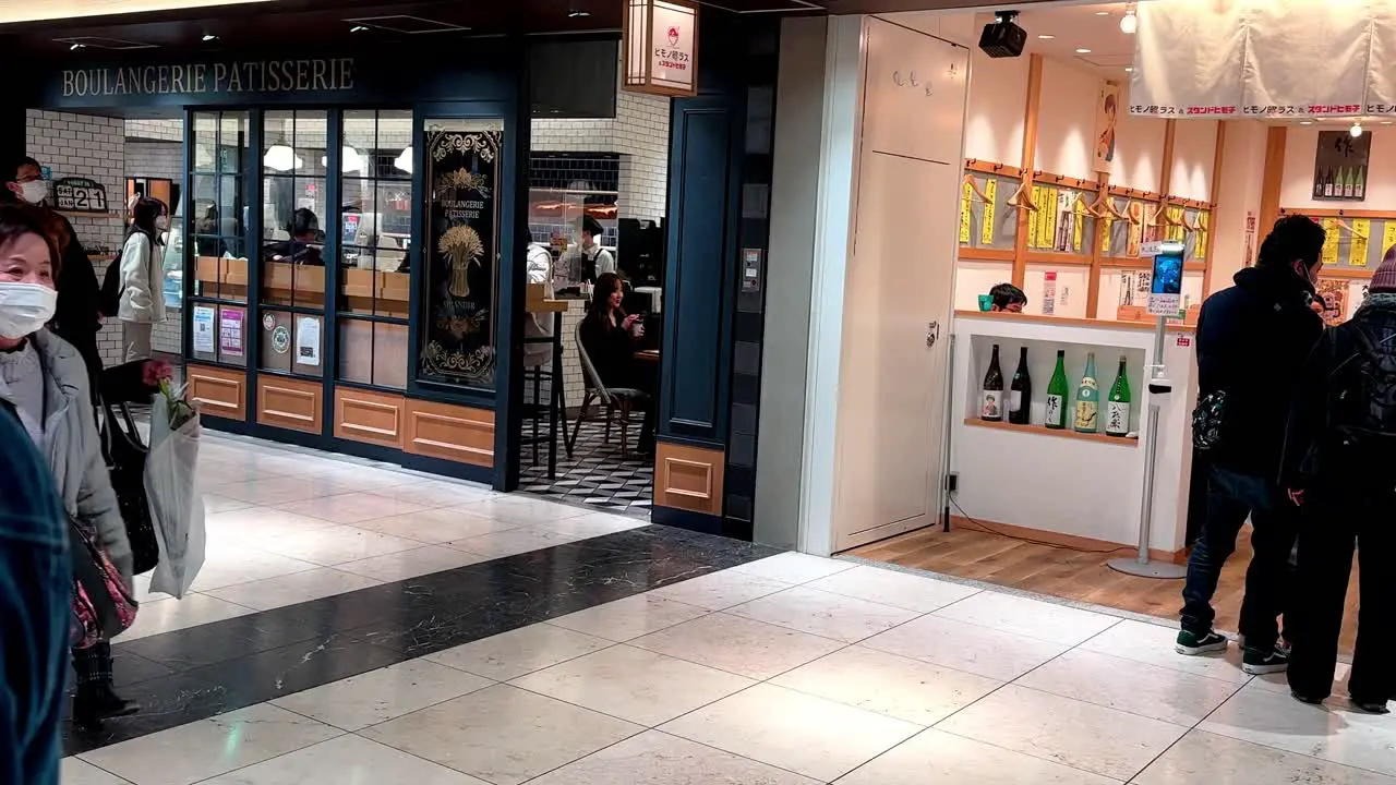 People Walking in Indoor Shopping Mall Kyoto Japan