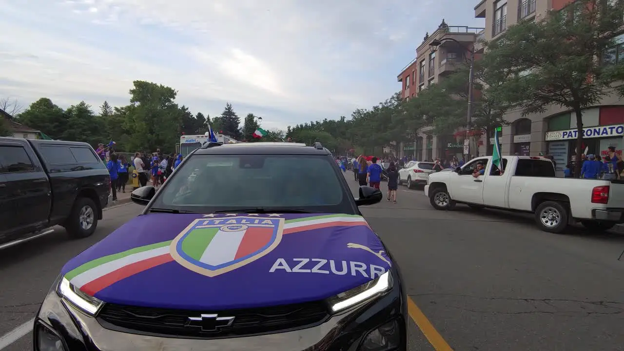 Car decorated with Italian flag people celebrating Italy wins Euro cup Woodbridge