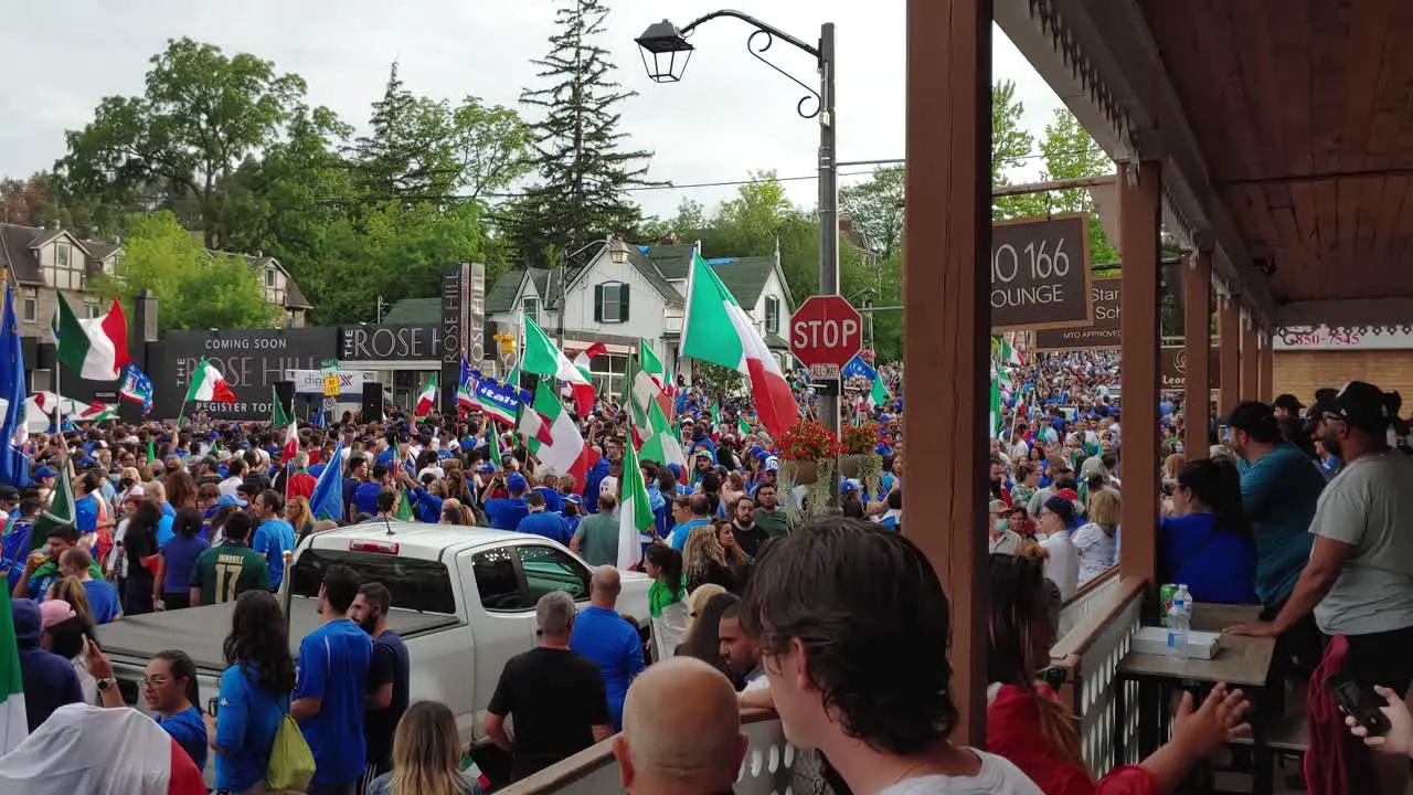 Motion shot Street full of people celebrating Euro cup 2021 Italia Winner Woodbridge