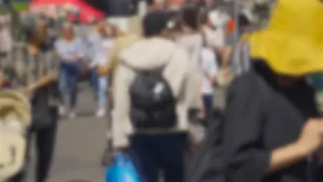 Defocused Shot of People In Bustling London Market