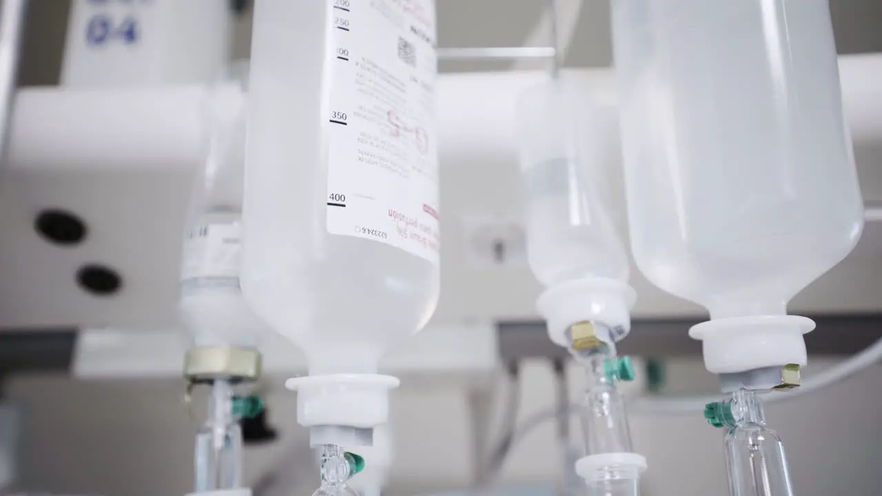 Serum fluid glucose bottles hanging at covid hospital ward