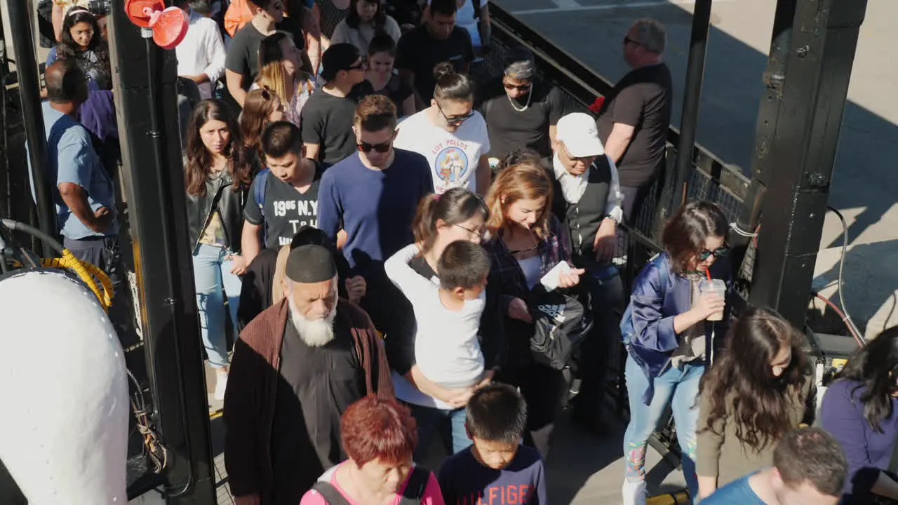 Crowd Boarding Ferry