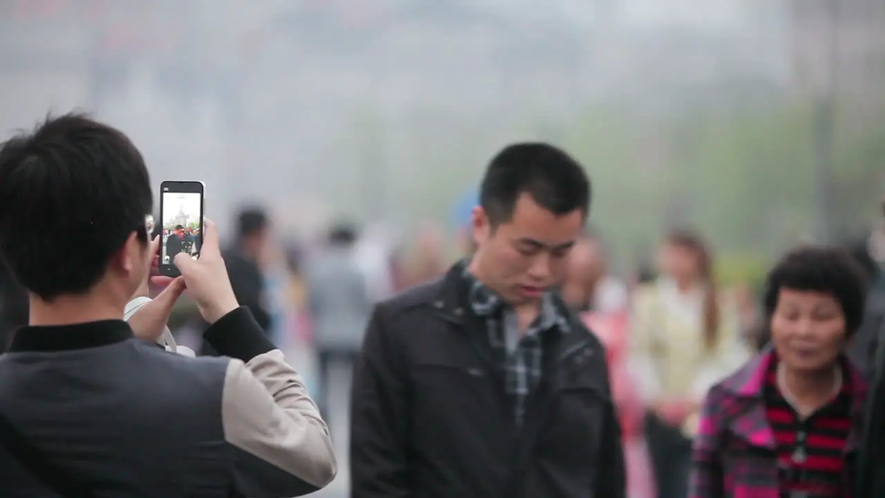 Huge crowds walk on the streets of modern day China 7