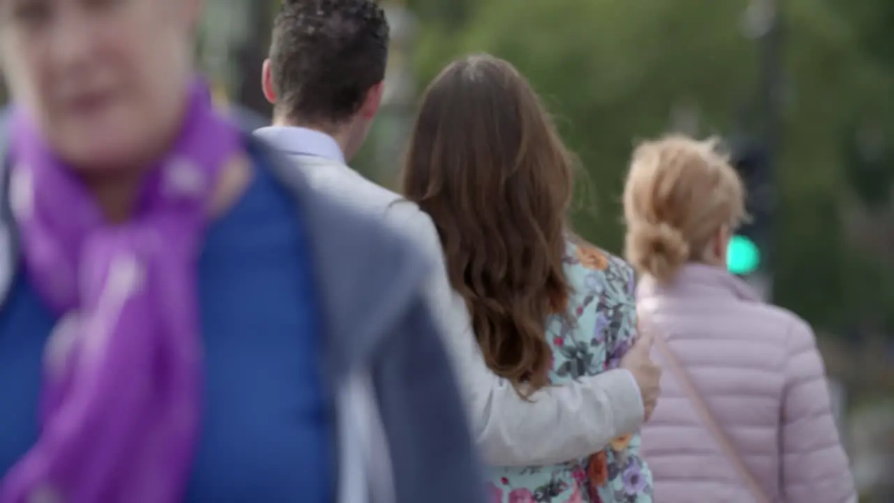 Couple Walking along Westminster Bridge