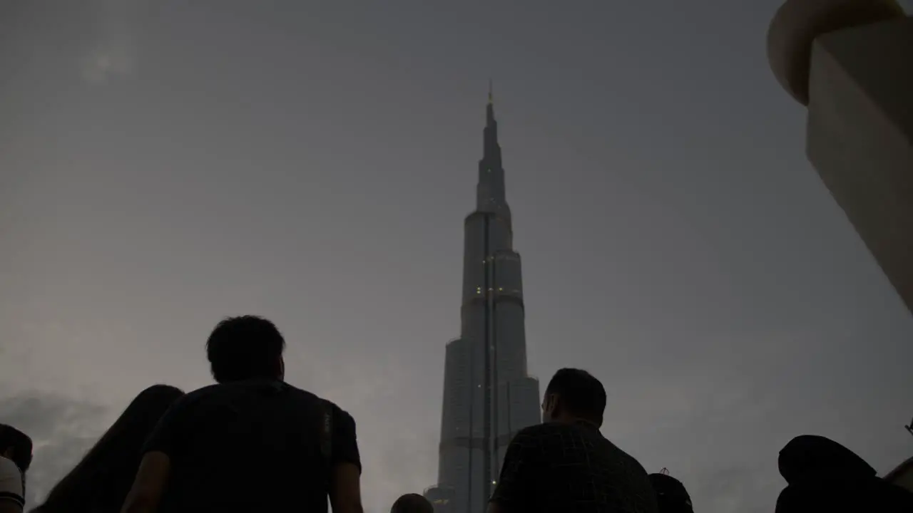 People looking up at the Burj Khalifa in downtown Dubai