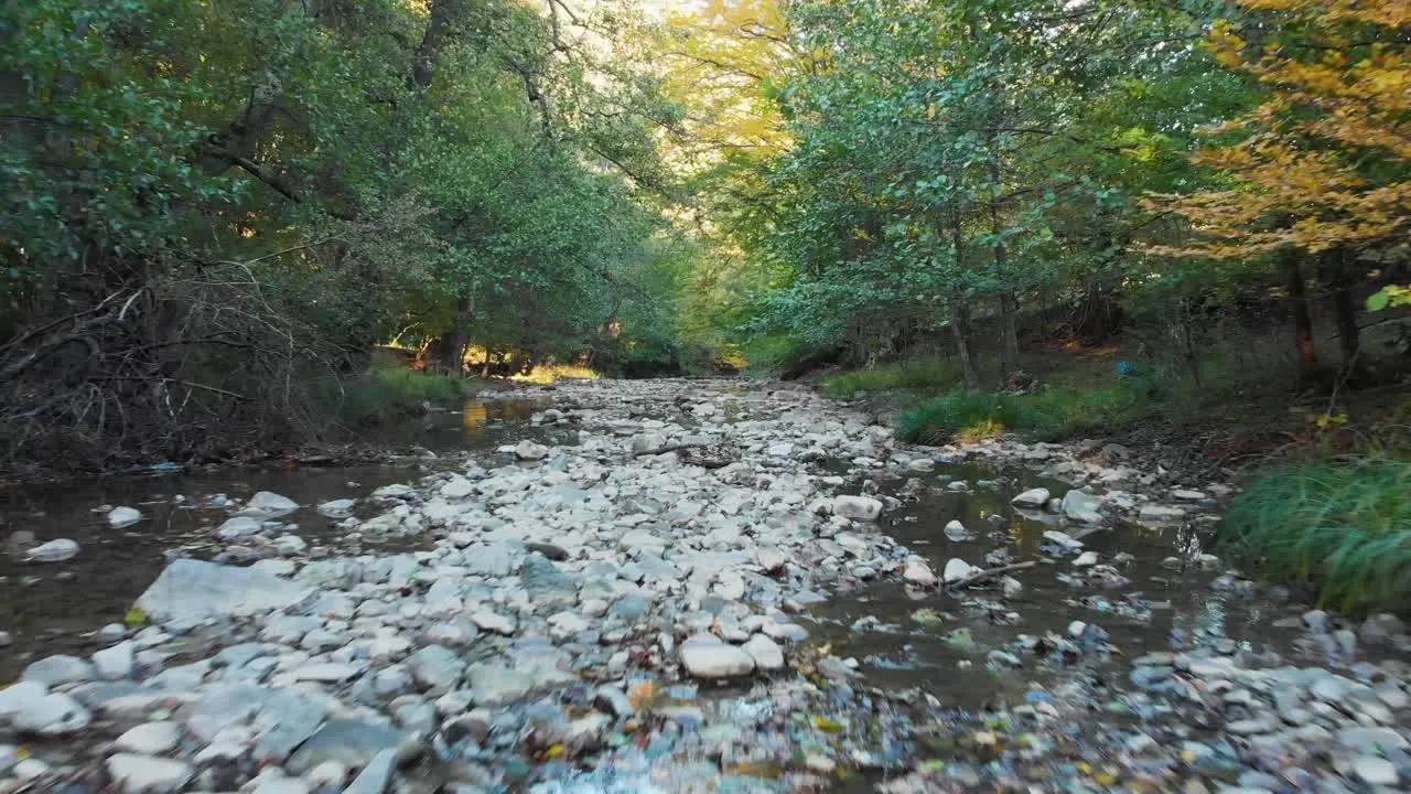 Low drone flight over small river-1