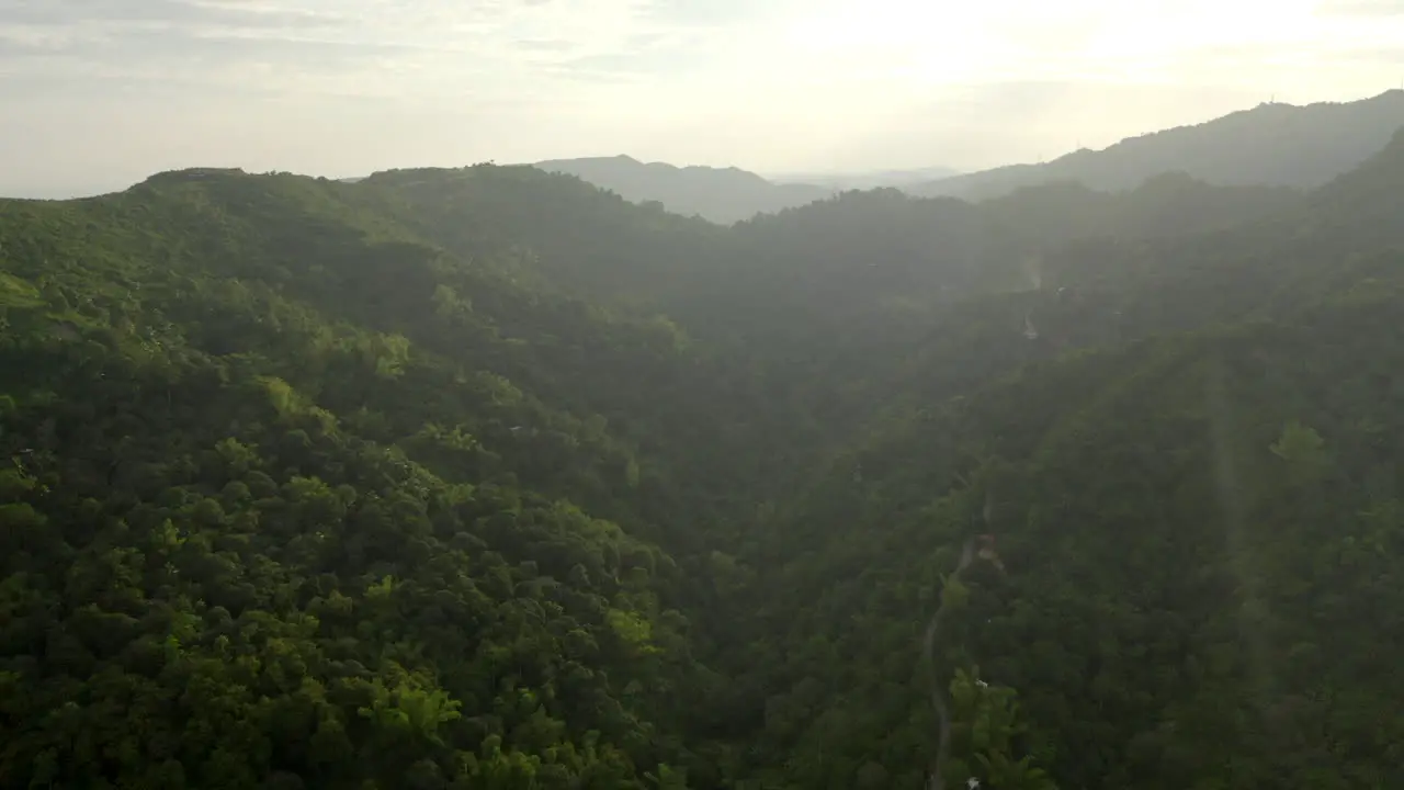 Aerial drone video above a green jungle in a warm tropical foreign country-4