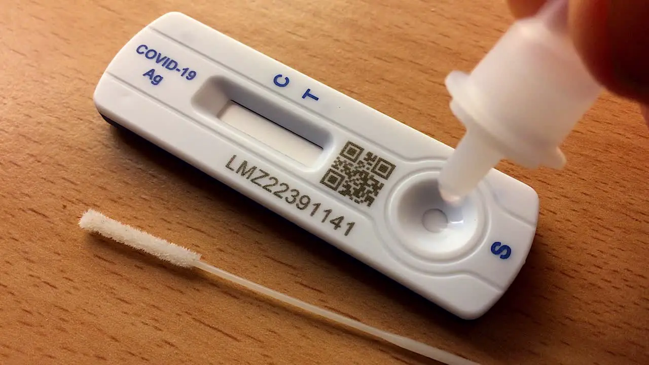 Covid-19 Positive Lateral Flow Test with Swab