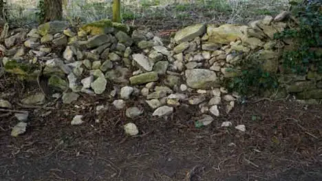 Pedestal Shot of Broken Stone Wall