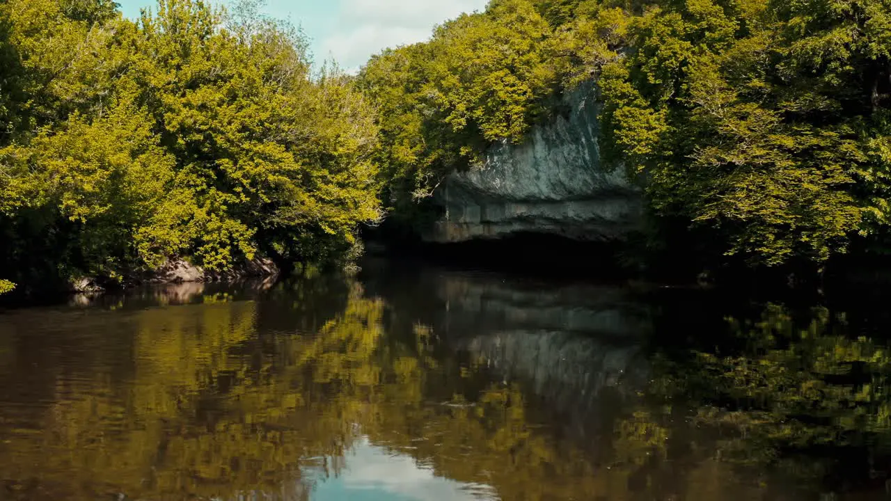 drone shot over a river in spring in the Dordogne France