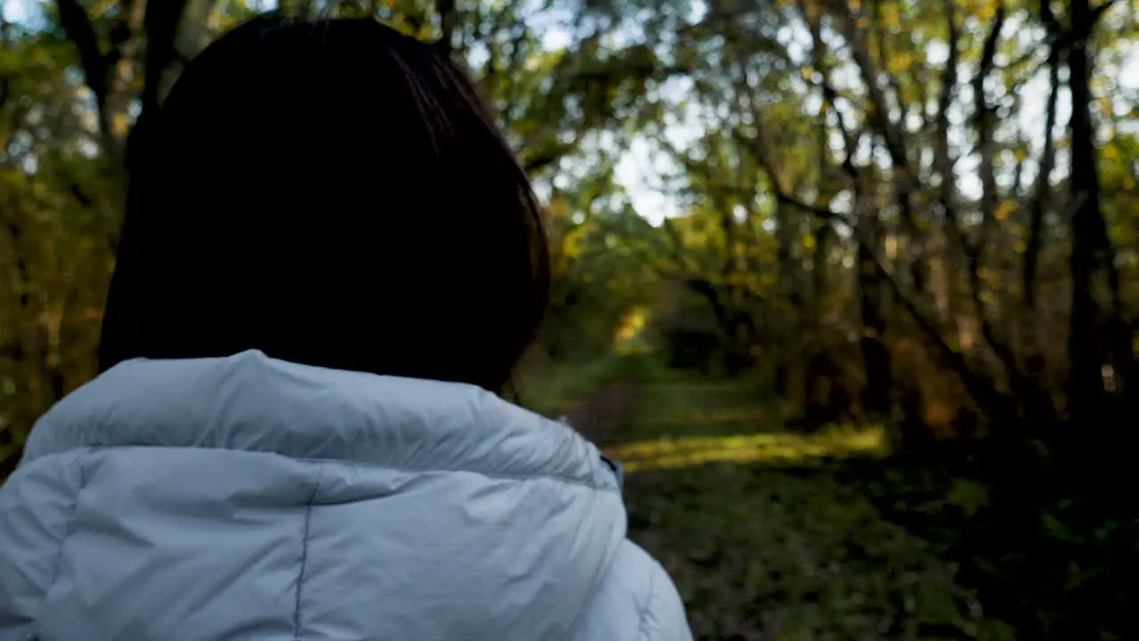 A Close Up Over the Shoulder Shot of a Woman Hiking