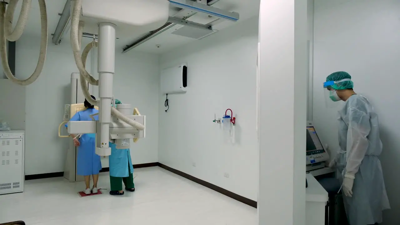 Lab Technician Perform Chest X-ray for a Girl Editorial