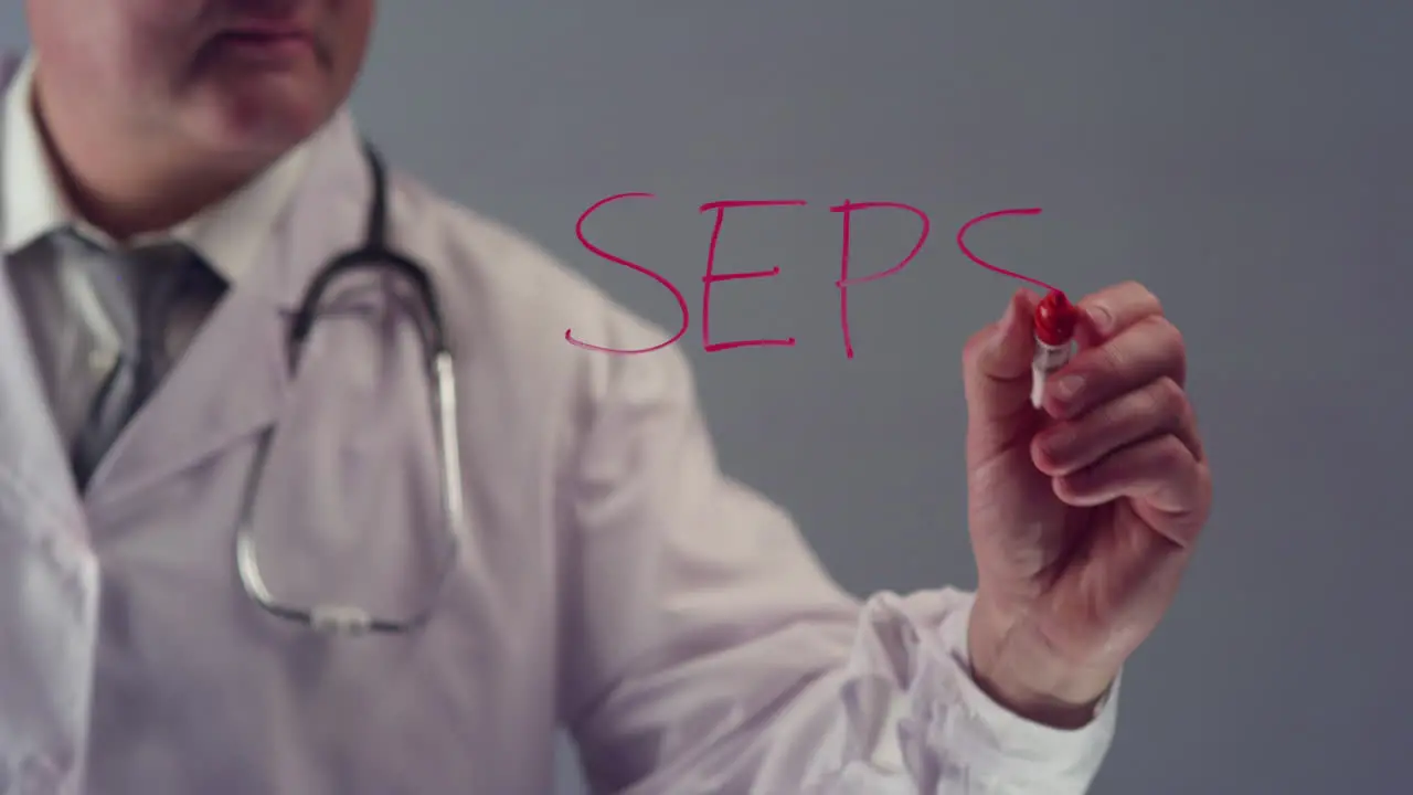 Doctor Writing the Word Sepsis