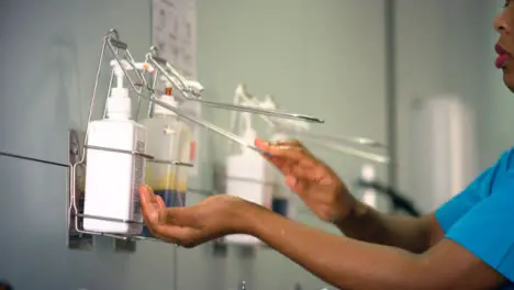 Medical Staff Using Soap Dispenser