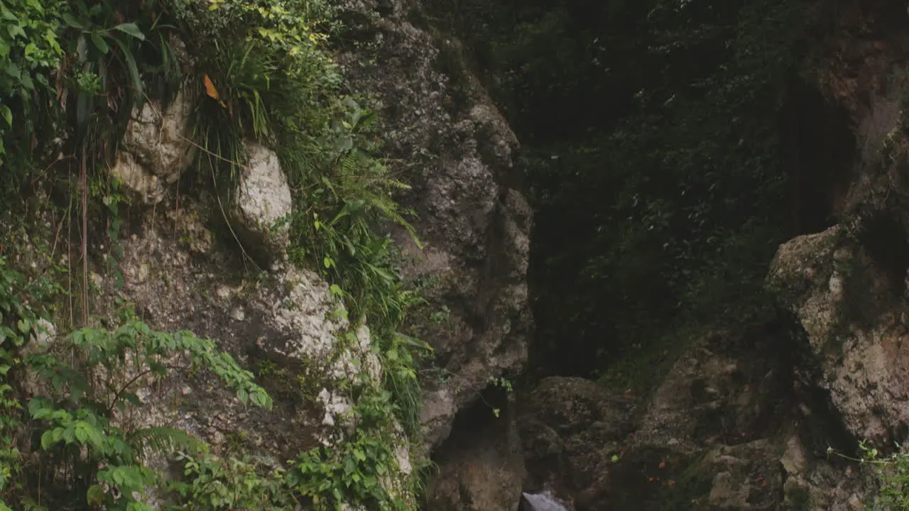 Rugged Cliffs With Small Waterfall At Natural Pool In Balneario Mata de Maiz Polo Barahona Province Dominican Republic