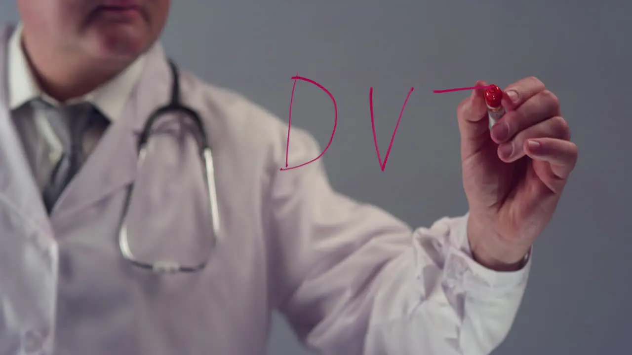 Doctor Writing the Term DVT