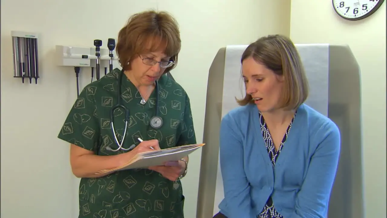 A Doctor Treats A Patient For Flu Like Symptoms