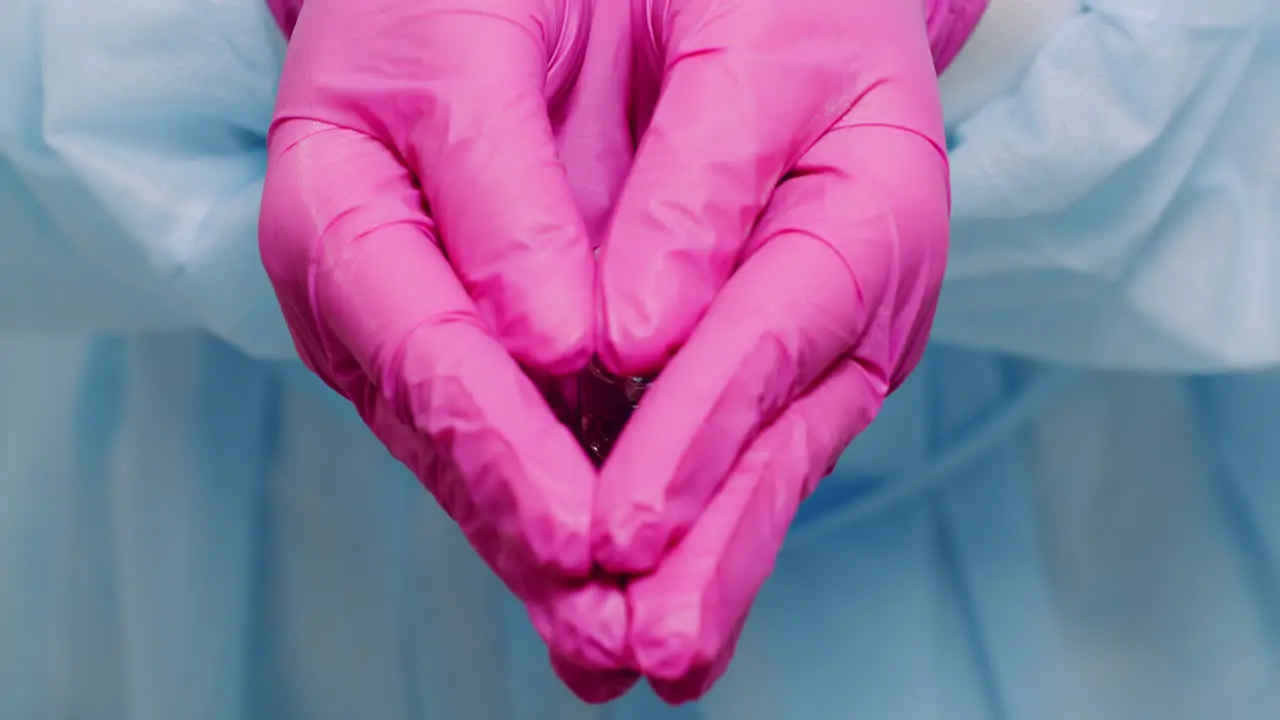 Doctor Holding And Examining Medicine In Hands 2