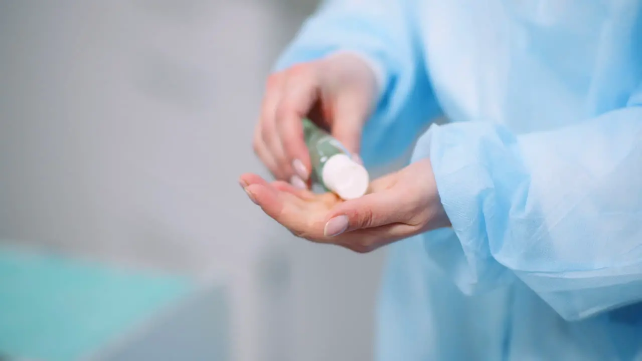 Surgical Hand Disinfection Woman Disinfecting Hands At Health Care Clinic 1