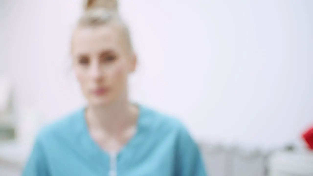 Beautiful Portrait Of Female Doctor Wearing Glasses At Healthcare Clinic