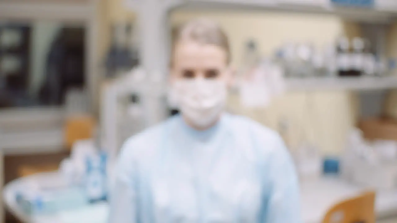 Scientist Wearing Protective Mask At Laboratory 3