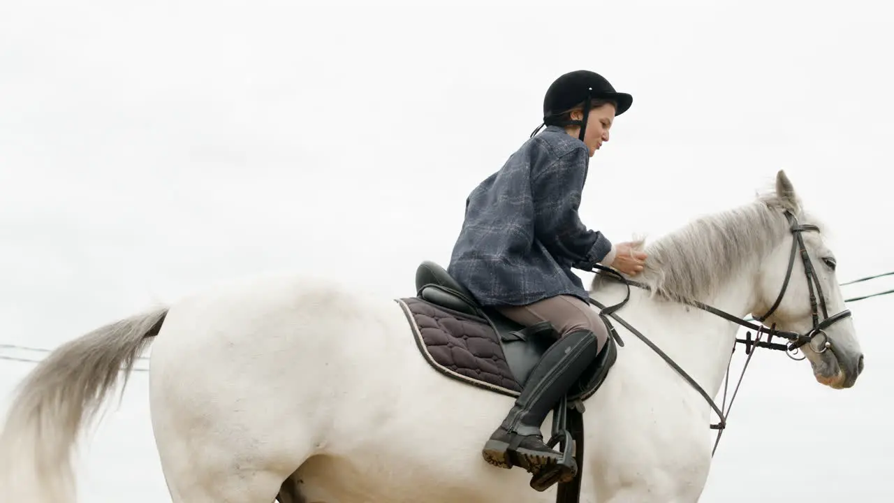 Woman Riding A Horse