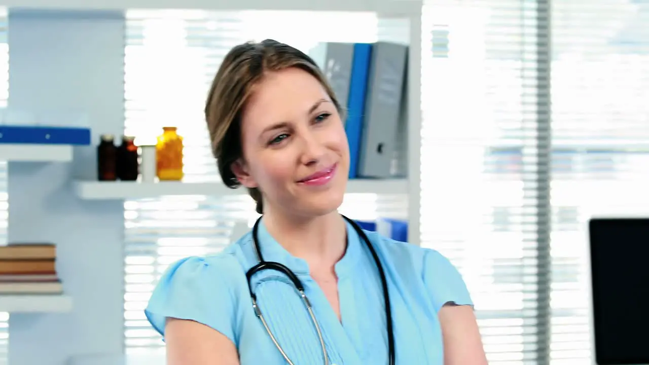 Female doctor giving a medical prescription to a patient