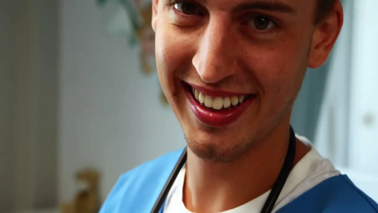 Doctor holding stethoscope in hospital