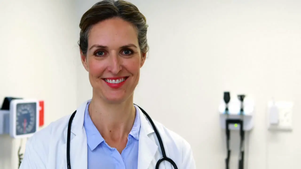 Female doctor holding clipboard