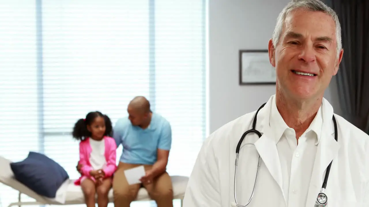 Portrait of smiling male doctor