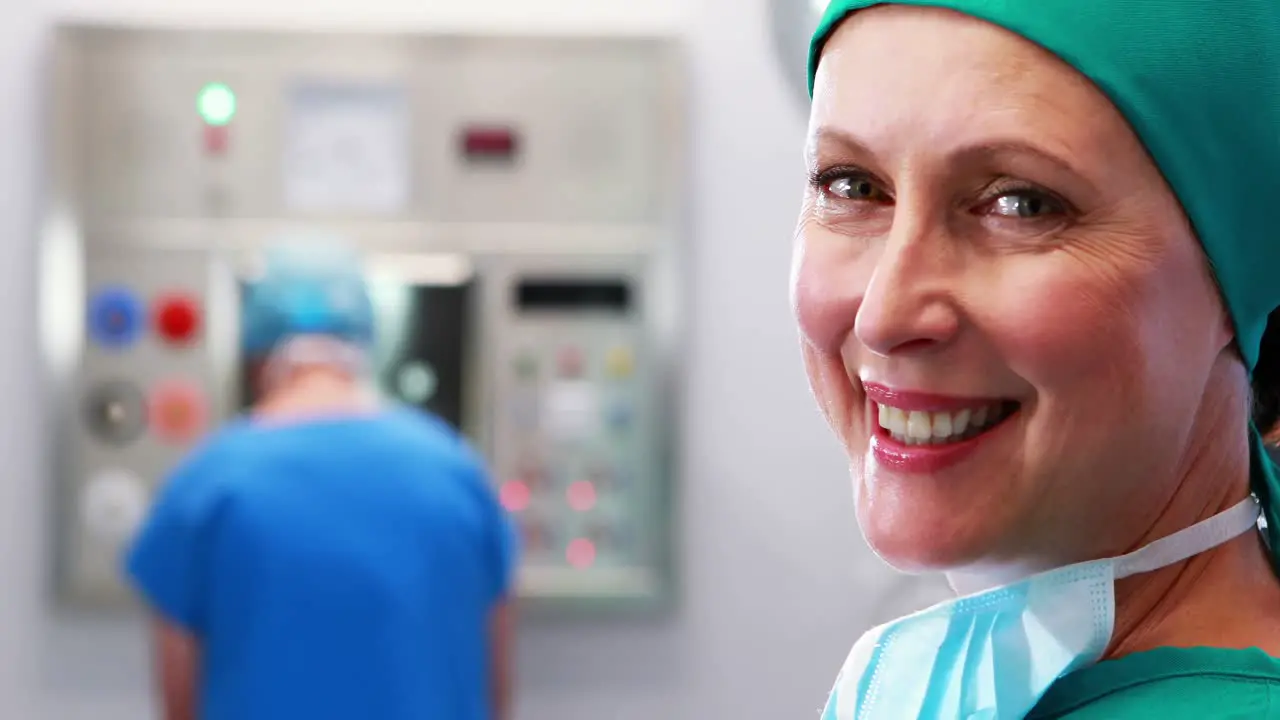 Female nurse in surgical cap at operation theater