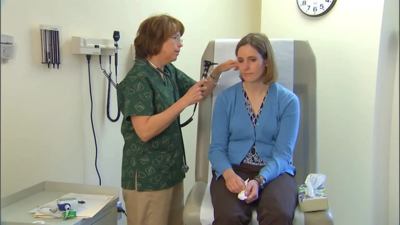 A Doctor Treats A Patient For Flu Like Symptoms 3