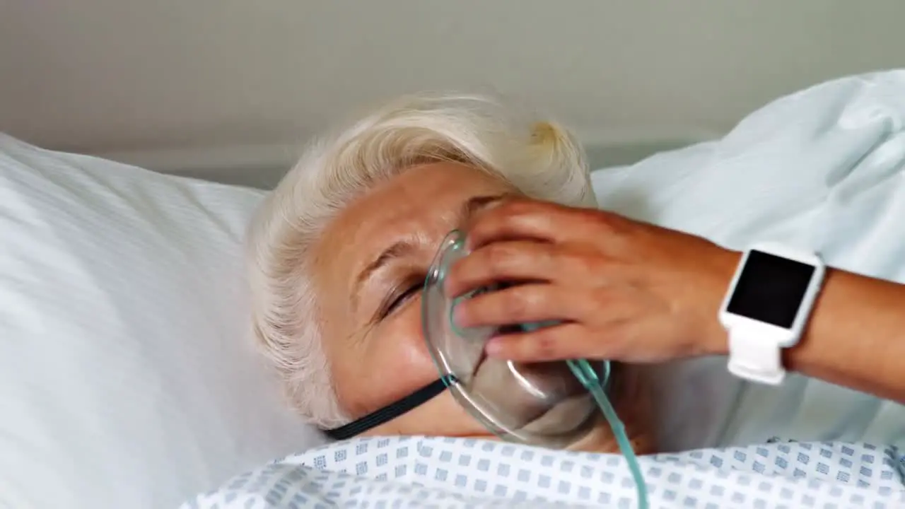 Senior patient with oxygen mask