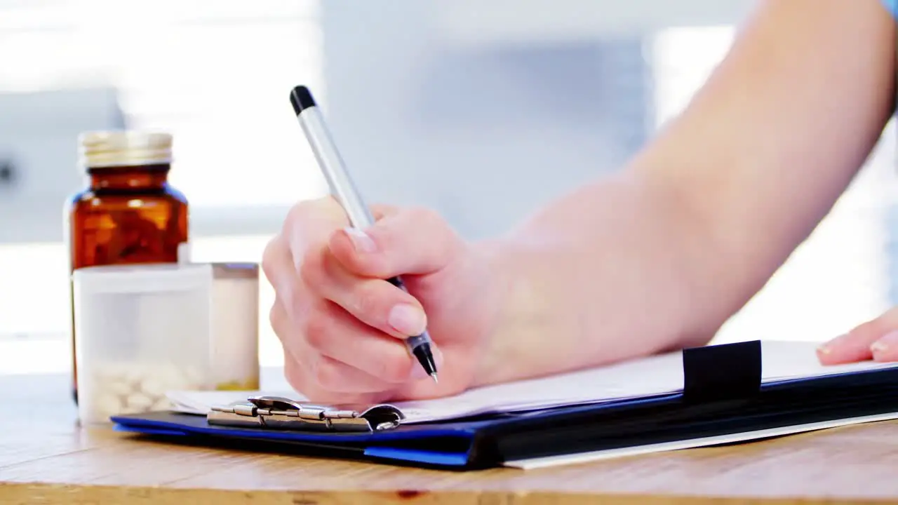 Female doctor working at her desk