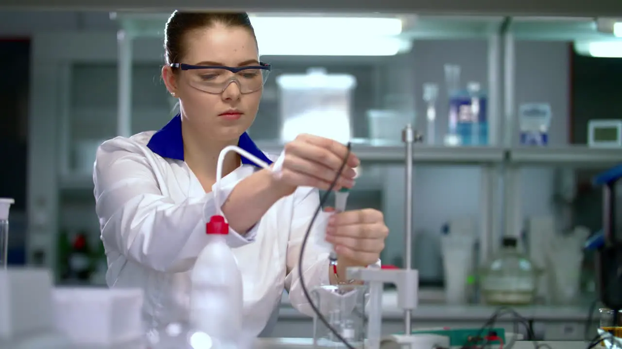 Young scientist in medical laboratory Doctor preparing laboratory equipment