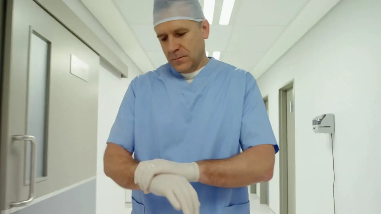 Surgeon walking in hallway