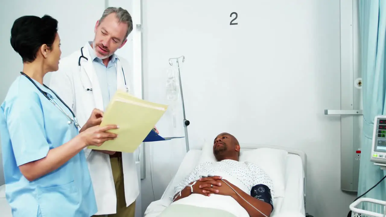 Doctor and nurse interacting with patient